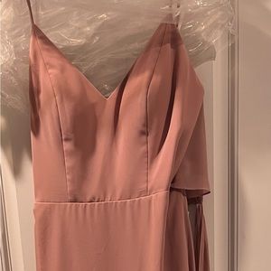 Formal dress size 8. Pink in color or gardenia.